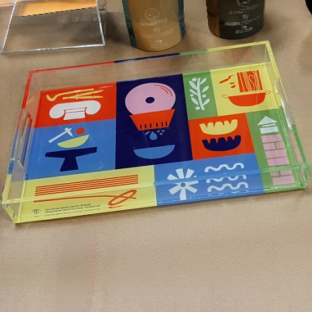 Clear acrylic tray with customized printing on the bottom