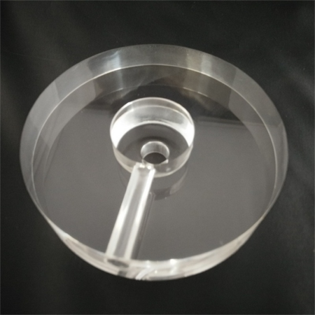 Round clear acrylic lamp base with a central hole and wire channel
